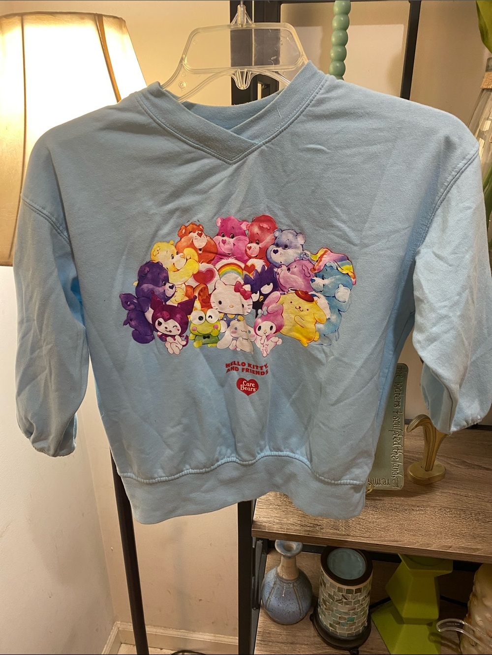 Sanrio Light Blue Pullover Sweatshirt with Colorful Character Cluster